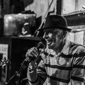 Oldy singing in music bar