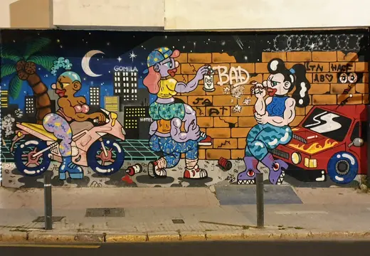 Gomila Wall Mural with Motorbike and Red Car