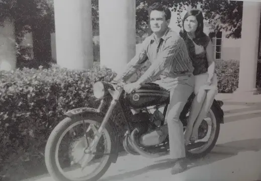 Couple on a Motorcycle in Cas Català