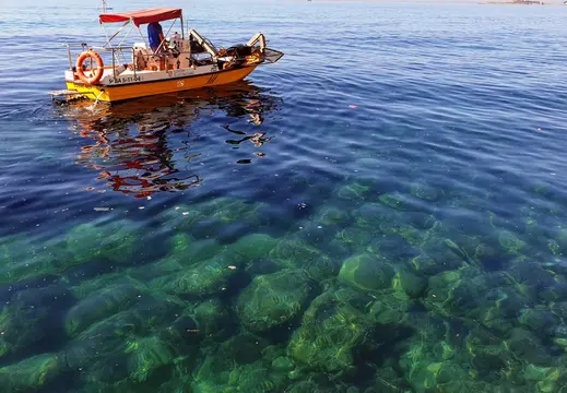 Small Wooden Boat off Cala Major