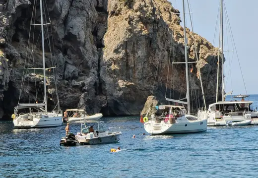 Sailboats Beside the Cliffs of Cala Deià