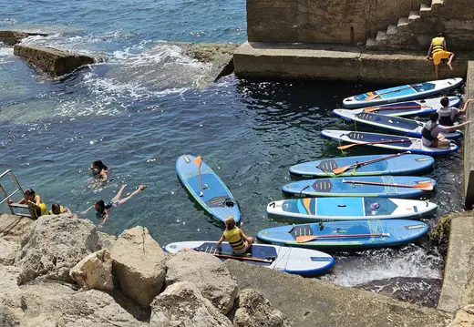Paddleboards Along the Sant Agustí Shore
