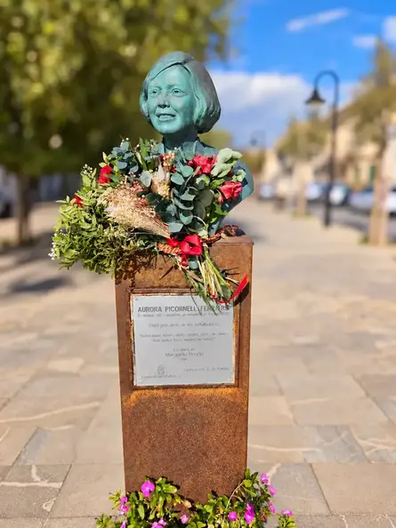 Bronze Bust and Flowers, Soft Bokeh.webp