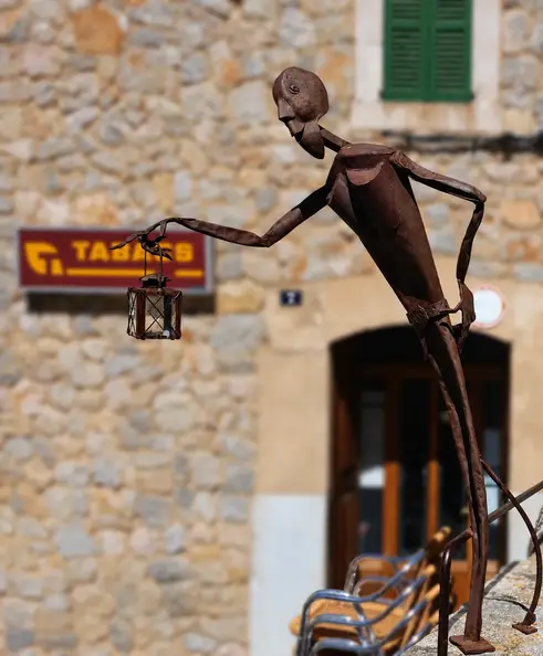 Rusty Sculpture with Blurred Background.webp