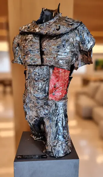 Abstract Metallic Torso, Soft Background.webp