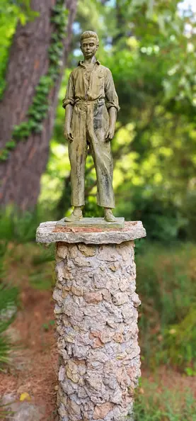 Sharp Statue, Soft Forest Bokeh.webp