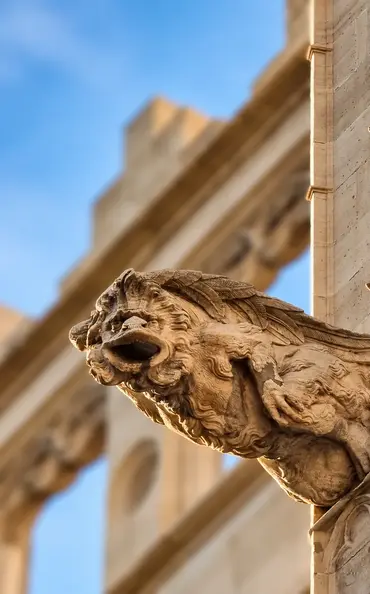 Stone gargoyle in shallow focus.webp