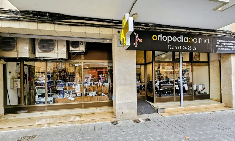 Ortopedia Palma storefront with sign, awning and mobility equipment display
